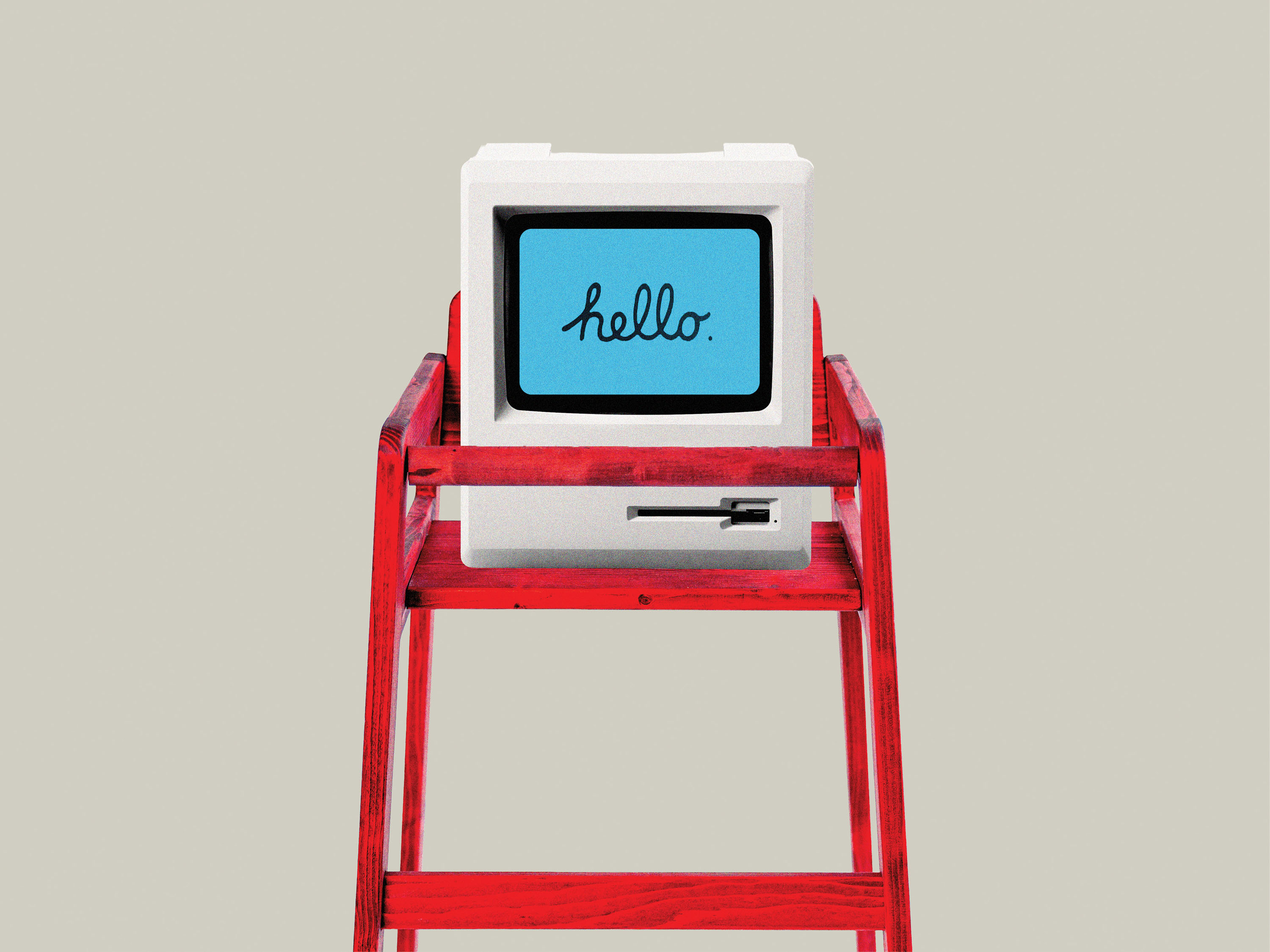 un ordenador retro con la palabra 'hello' escrita en cursiva en la pantalla, situado en una trona infantil