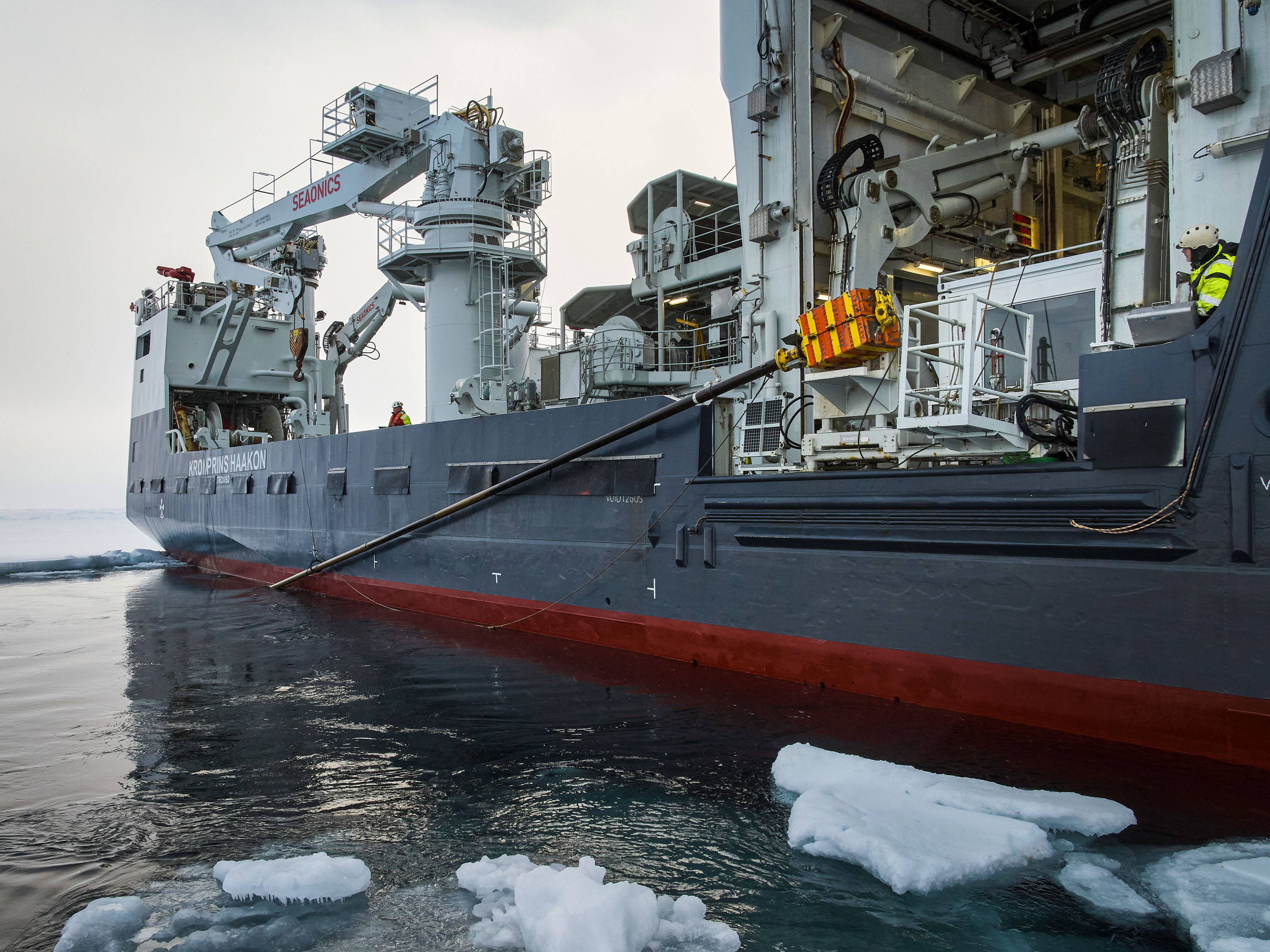 a view down the side of the ship at near water level