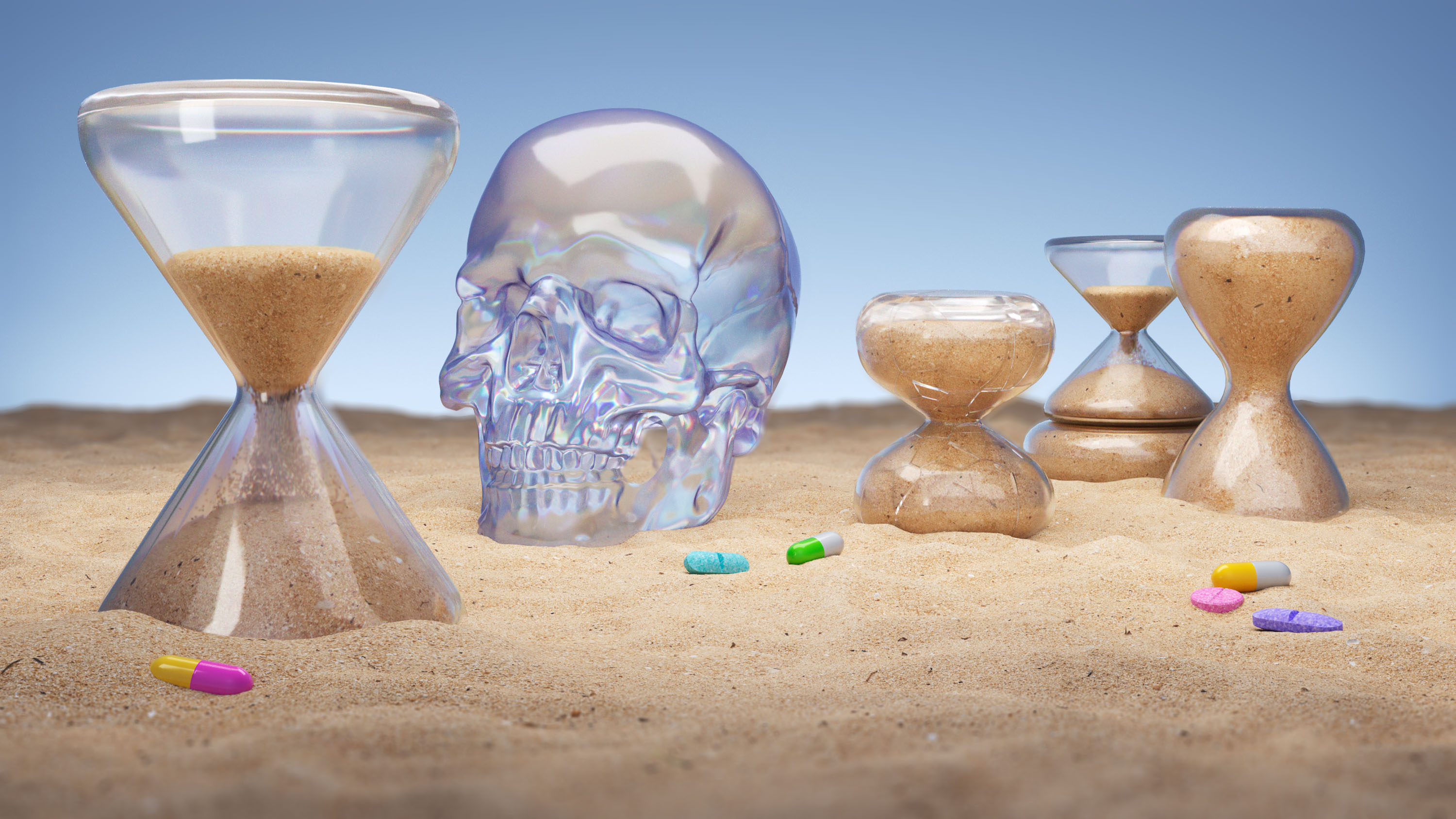 una calavera de cristal y un reloj de arena incrustados en arena con suplementos dispersos
