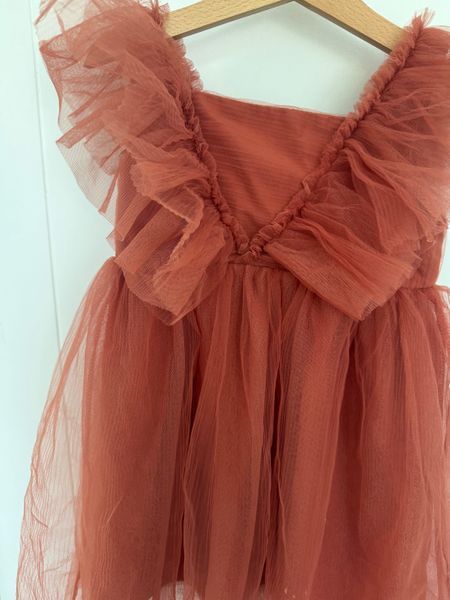 Gorgeous frill dress 5-6 years. Brick orange colour.