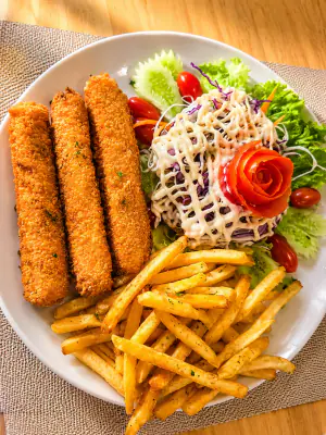 Plant-based protein sticks and french fries.