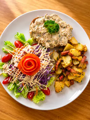 Wood ear mushroom steak with sautéed potatoes and mushroom cream sauce.