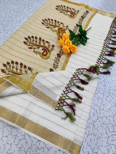 white kerala saree
