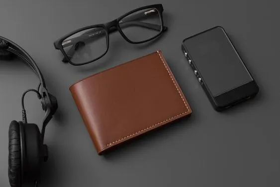 Different wallet styles on various backgrounds, reflecting personal fashion