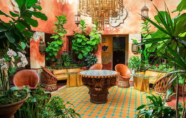 Interior of Fonda San Miguel with colorful Mexican decor and dishes