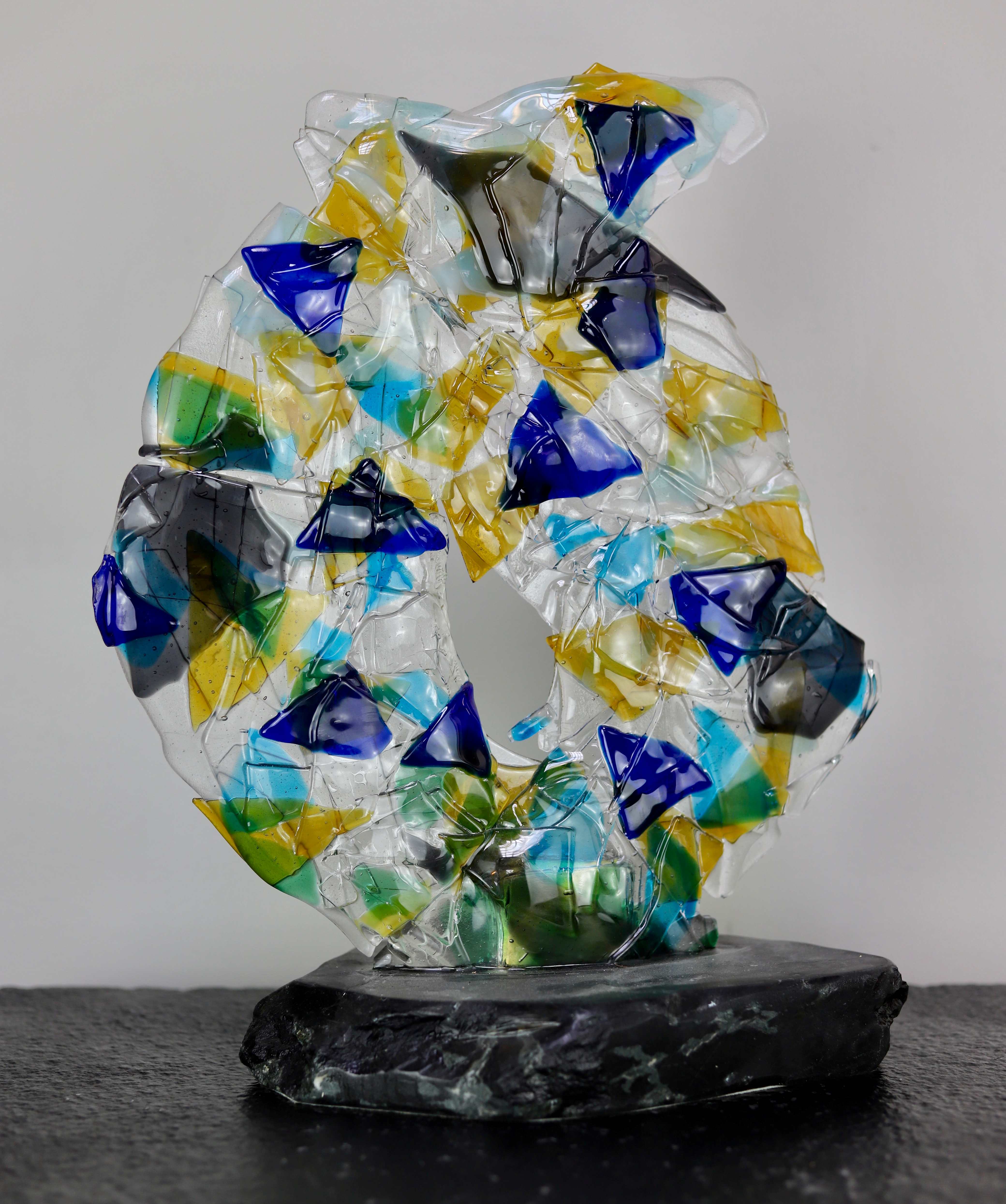 GLASS  SPHERE ON BLACK GRANITE
