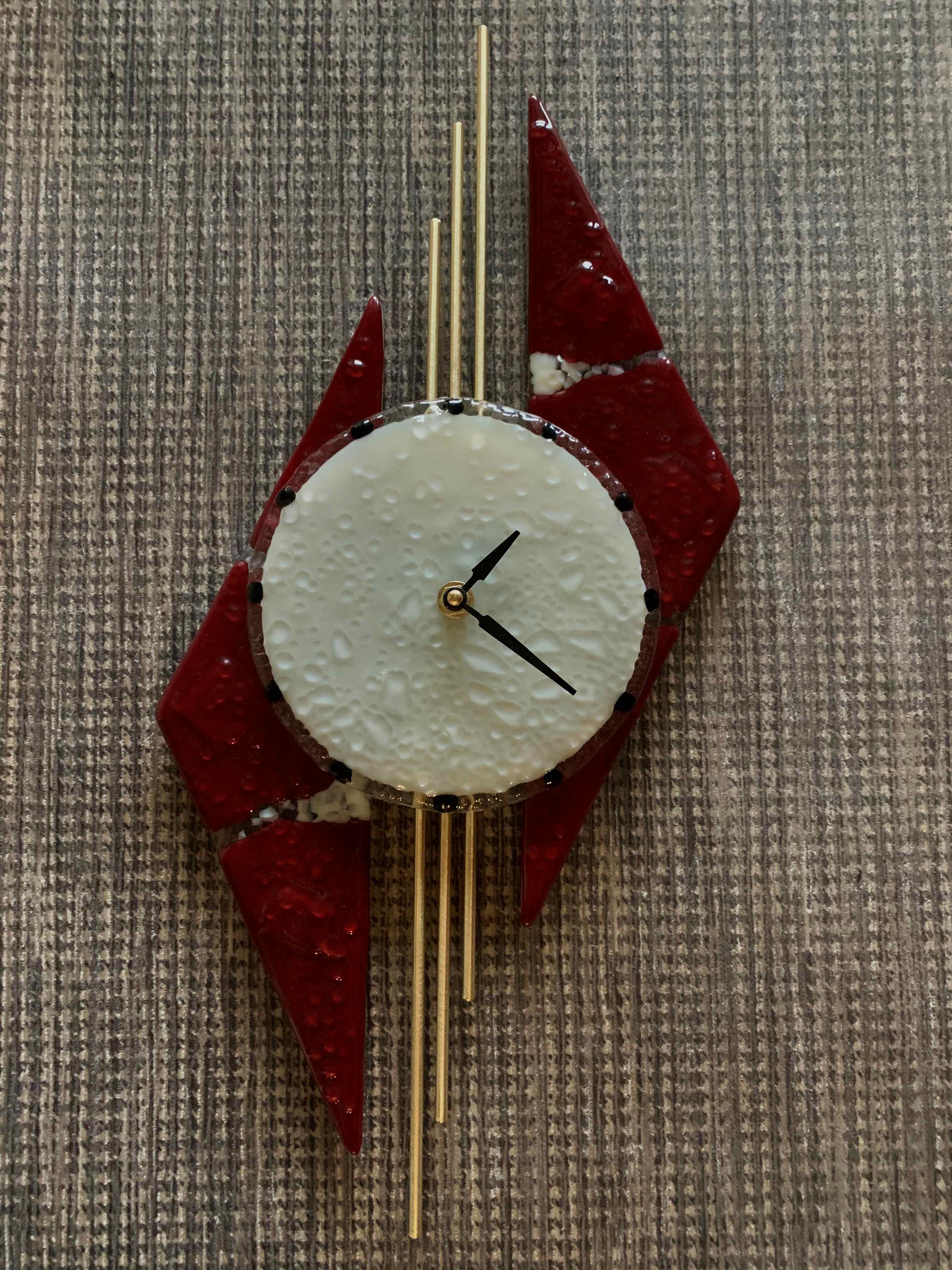GLASS TRIANGLE CLOCK WITH BRASS BARS