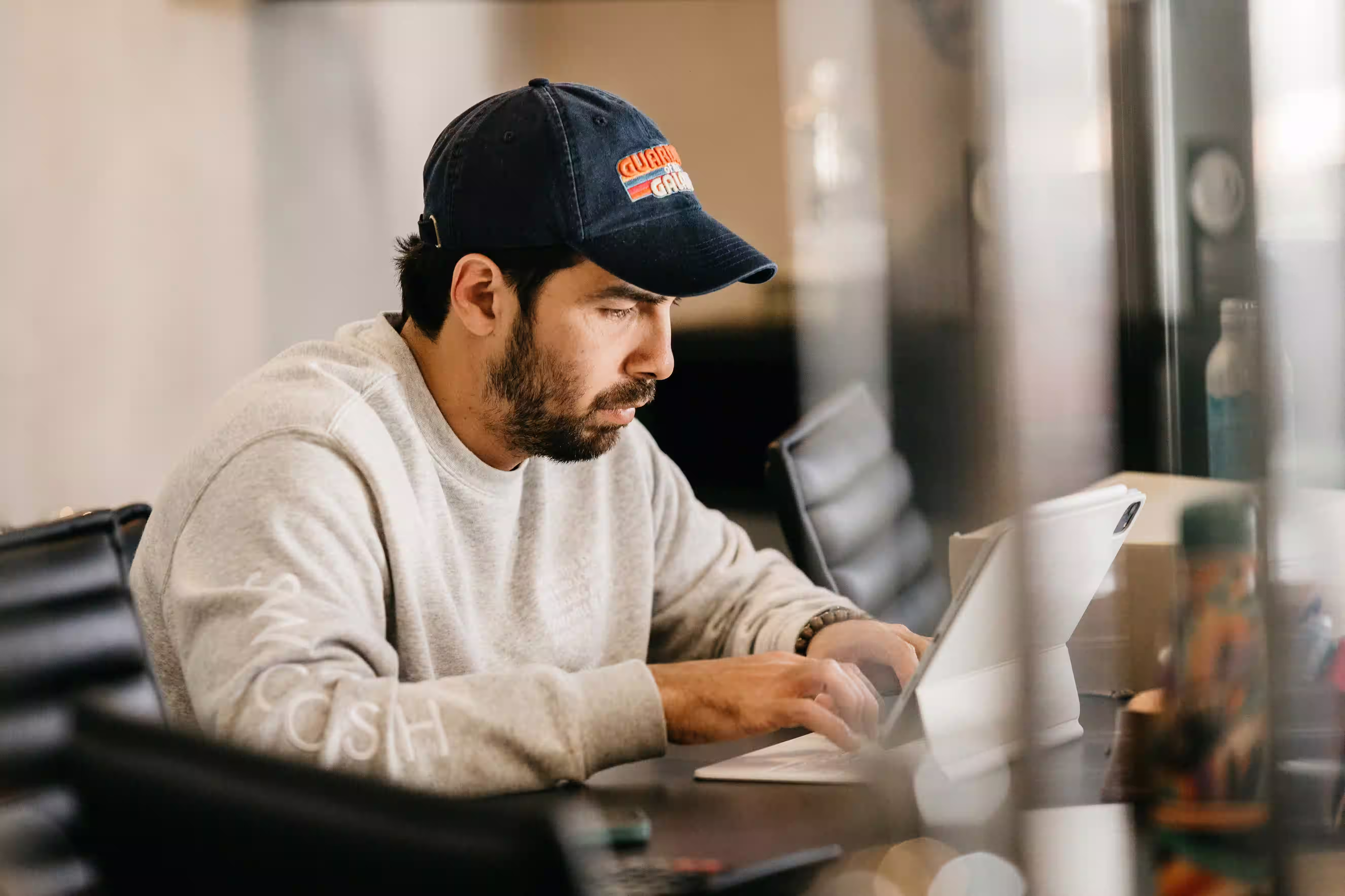 Contractor reviewing clawback and depreciation recapture documents at an office desk