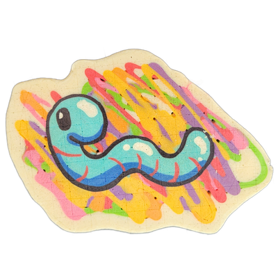 Hermie, a JoP original character depicted as a small blue worm with a round head, one visible eye, a slight smile, and short red leg-like appendages along the underside of a curved, segmented body. The pancake art uses bold black outlines around the character, a teal-to-blue batter fill with white…