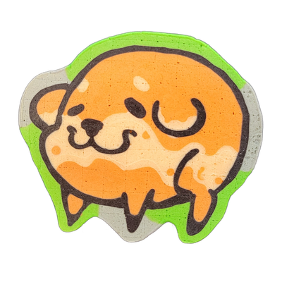 Pancake art of Poffridge, a Shiba Inu–shaped sentient poffertje from the JoP cast, depicted as a round, chubby cartoon dog face and upper body with closed curved eyes, a small dark nose, and a cream-colored muzzle area against an orange-toned body, with short stubby legs visible at the bottom. Rend…