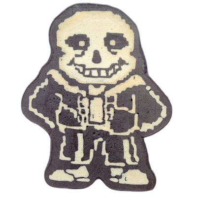 A pancake art depiction of Sans, a skeleton character from the video game Undertale, shown in a full-body frontal pose with a wide toothy grin, large hollow eye sockets, and a relaxed stance with one arm raised and the other at the side, wearing a hooded jacket, shorts, and boots rendered in a pixe…