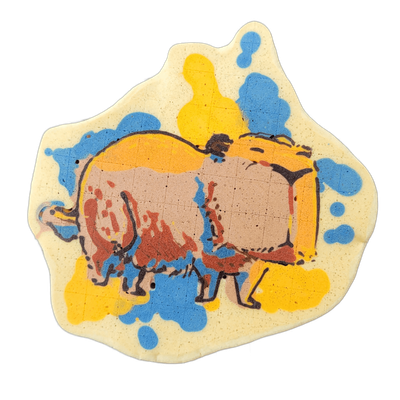 A capybara shown in side profile, facing right, with a large rounded body, short legs, and a blunt squared-off head; the figure is surrounded by irregular splashes and blobs in blue and yellow batter against a pale cream background.