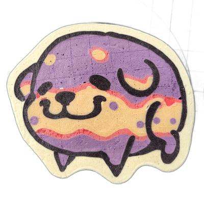Pancake art depicting Poffridge, a Shiba Inu-shaped sentient poffertje from the JoP cast, shown as a round, squat face with small black nose dots, curved eyebrow-like marks, and paw or ear shapes extending from the sides, all sitting atop a drip-edged base that echoes a poffertje's rounded form. Re…