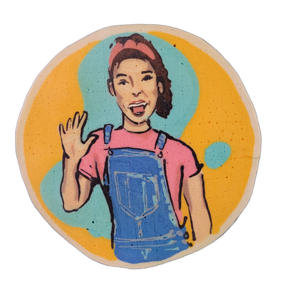 Pancake art portrait of Ms. Rachel, depicted from the waist up wearing blue overalls over a pink short-sleeve shirt, with dark curly hair pulled back with a pink headband, mouth open, and one hand raised in a wave. Drawn by Dan with bold black outlines, filled with flat areas of blue, pink, yellow,…