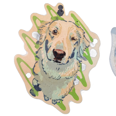 Pancake art of a light-furred dog named Sugarpie, shown from the chest up, facing slightly upward with mouth open and teeth visible, rendered in warm tan and pale mint tones with dark gray-blue brushstroke-style marks and bold green loop and drip shapes layered over the figure. The portrait uses fi…