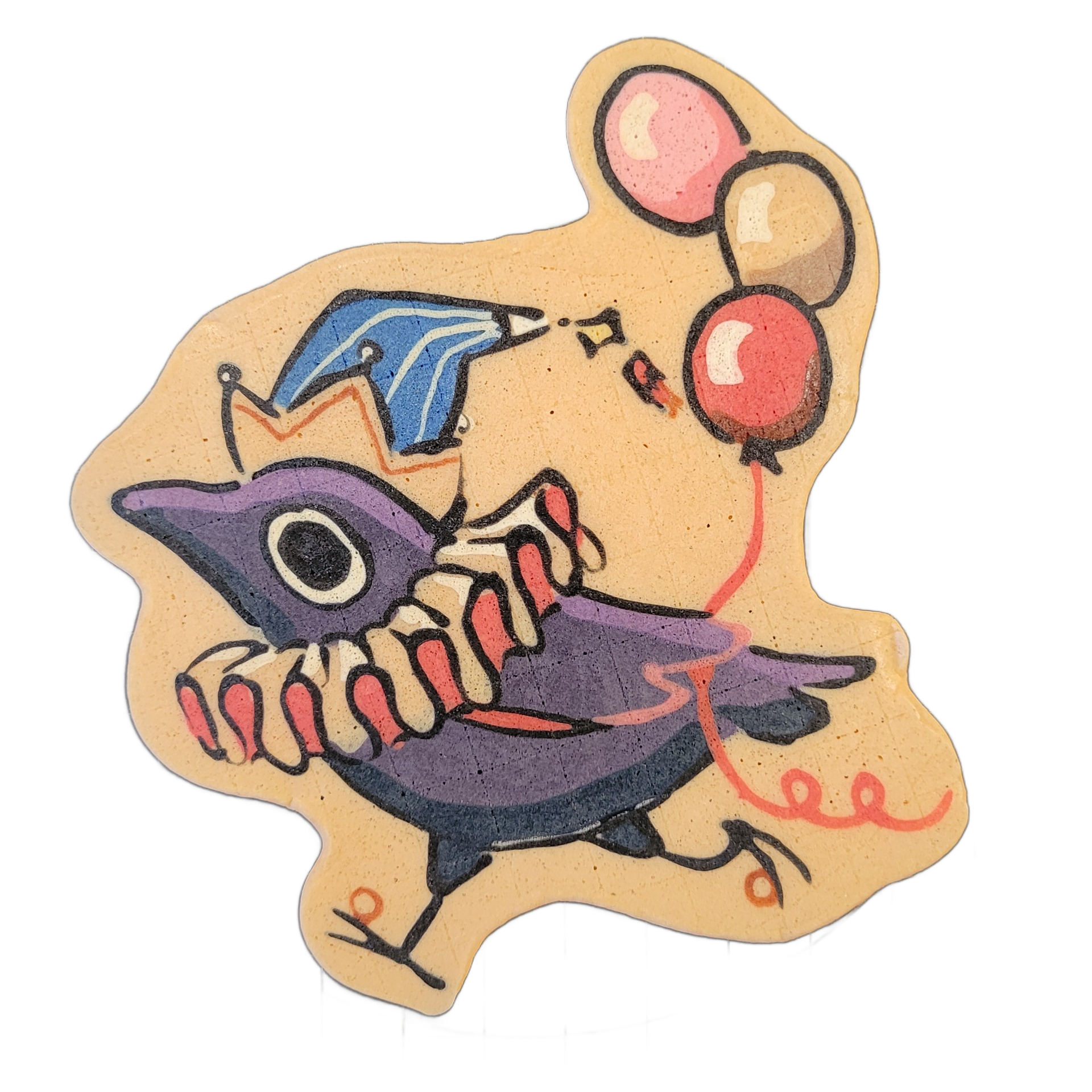 Pancake art depicting Jester Crow, an original character rendered as a stylized purple crow with a large circular eye, an open beak showing teeth, red-tipped talons, small wings, and stick-like legs, wearing a blue and orange party hat; the crow holds a string attached to three balloons in pink, ta…