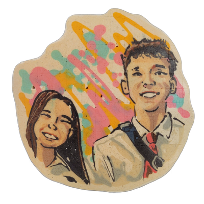 Pancake art portrait of two young adults side by side, both smiling broadly: on the left, a young woman with long dark hair falling past her shoulders, and on the right, a young man with short dark curly hair wearing what appears to be a light-colored jacket, collared shirt, and a red tie, with a s…