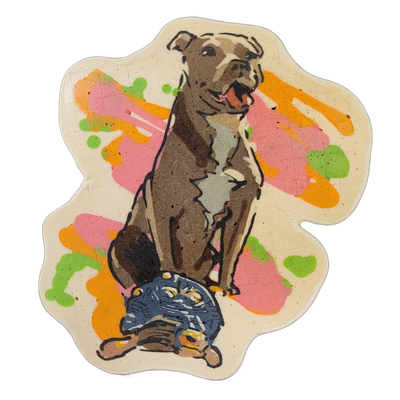 A brown, grey, and white pitbull sits upright with its mouth open and tongue out, positioned above a blue and yellow tortoise rendered in a curled or low posture; both animals are centered on a cream-colored irregular blob-shaped background with splashes of pink, orange, and green batter surroundin…