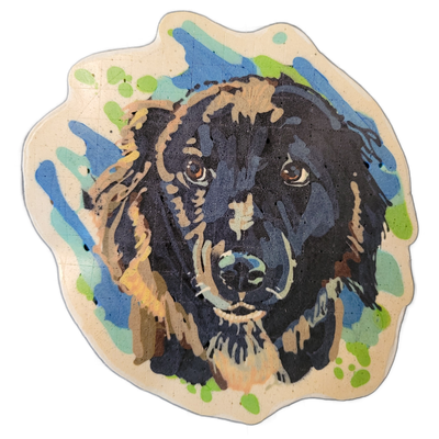 A pancake art portrait of Judge, a dog with thick dark fur, brown eyes, and a broad muzzle, depicted from the chest up facing forward with slightly open mouth. Drawn by Dan using fine and medium batter lines over filled areas, with a palette centered on deep navy and black for the fur, warm tan and…