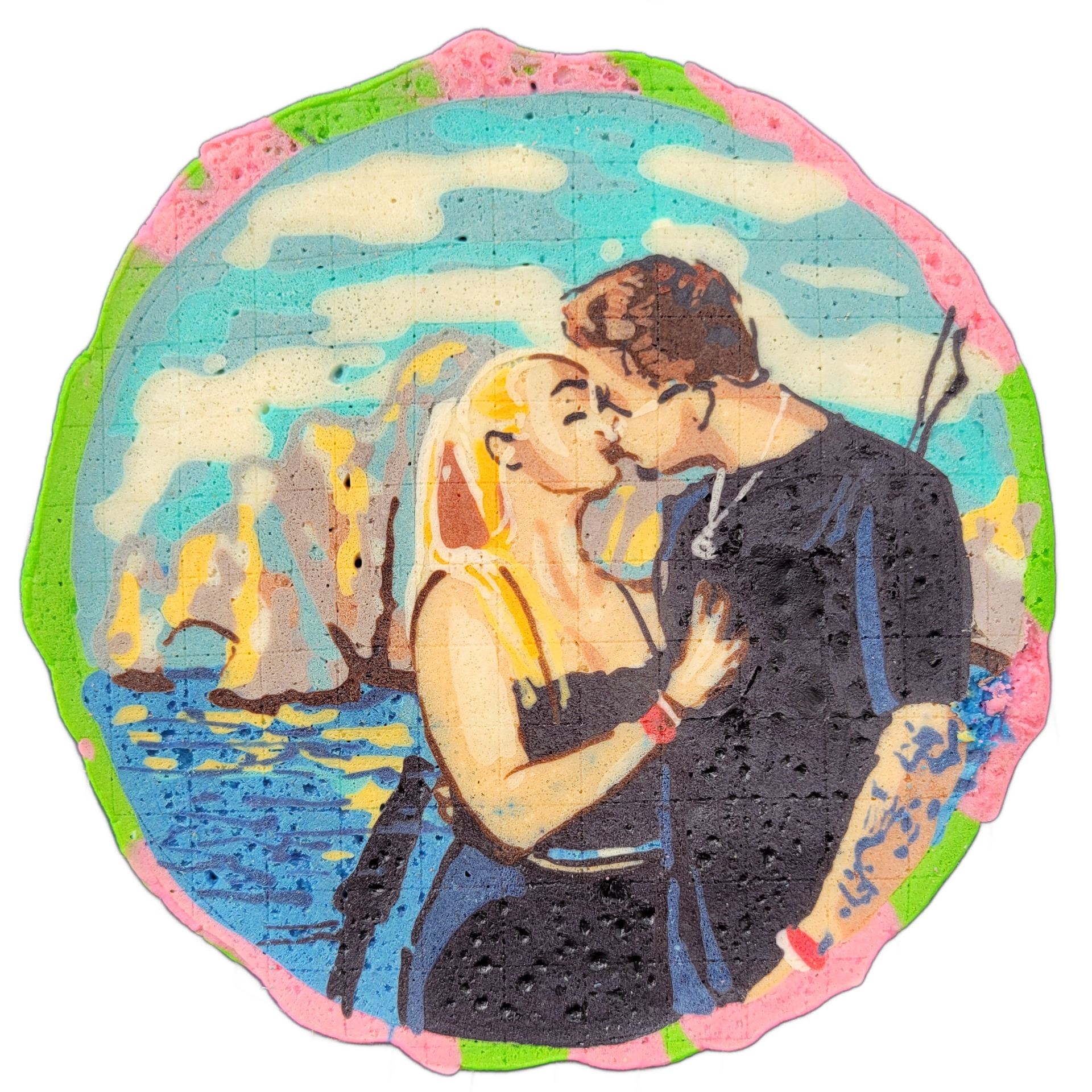 A couple named Elexis and Devin, depicted from approximately the waist up, kissing; Elexis has long blonde hair and wears a dark spaghetti-strap top and has a red wristband, while Devin has short brown hair, wears a dark long-sleeve top, and has a visible tattoo on one forearm, with rocky sea stack…