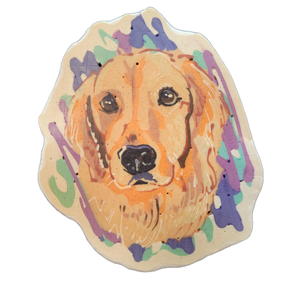 Pancake art portrait of a dog named Rosie, shown as a close-up face with medium-length fur, dark brown eyes, and a broad dark nose, facing forward against a background of loose brushstroke-style batter marks in violet, mint green, and teal. Rendered with bold outlines in dark brown and black batter…