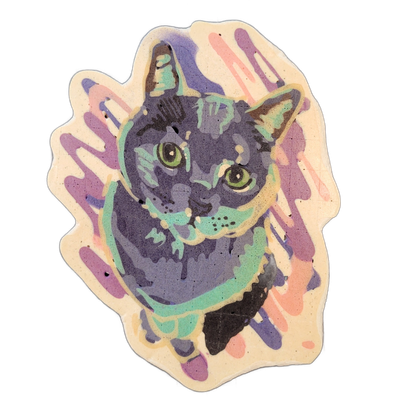 A cat named Kirby rendered as a head-and-chest portrait, facing slightly left, with green eyes, dark gray fur with tabby-style striping, and a lighter muzzle area. The pancake art uses bold outlines in near-black batter, filled with violet, teal, and peach tones, set against a cream background deco…