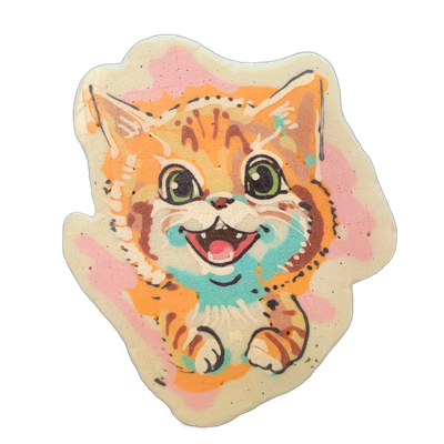 A cartoon kitten rendered in pancake art, shown from the front with large green eyes, an open mouth with visible teeth and a pink tongue, a teal-tinted muzzle area, and orange tabby striping on the head, ears, and paws, set against a background of orange and pink color blocks.