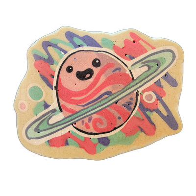 Saturnina, a JoP original character depicted as a cartoon planet with Saturn-style rings and a simple expressive face — two small circular eyes and an open oval mouth rendered in black — with red and pink swirling bands across the planet's surface and a ring system drawn in sage green and gray-blue…