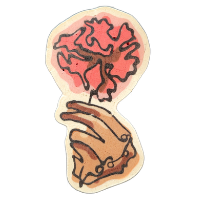 Pancake art depicting a hand holding up a single stem topped with a large, loosely rendered flower or plant with ruffled, irregular petals, set against a circular pink wash that forms a halo-like backdrop behind the bloom. Bold black outlines define the hand, stem, and flower forms; the hand is fil…