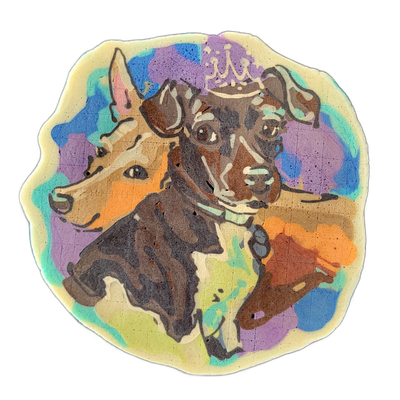 Pancake art depicting two dogs named Penny and Captain: a smaller dark brown dog wearing a small crown is positioned in the foreground center, and a larger tan dog appears behind and to the left, both shown from roughly the chest up against a multicolor background. The piece uses bold dark outlines…