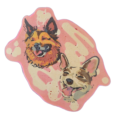 Pancake art depicting two dog faces: the upper-left dog, Atticus, has a long-haired coat rendered in orange, brown, and rust tones with pointed upright ears and an open mouth; the lower-right dog, Pete, has a shorter-coated face in cream and light brown with a wider head, floppy ears, and tongue vi…