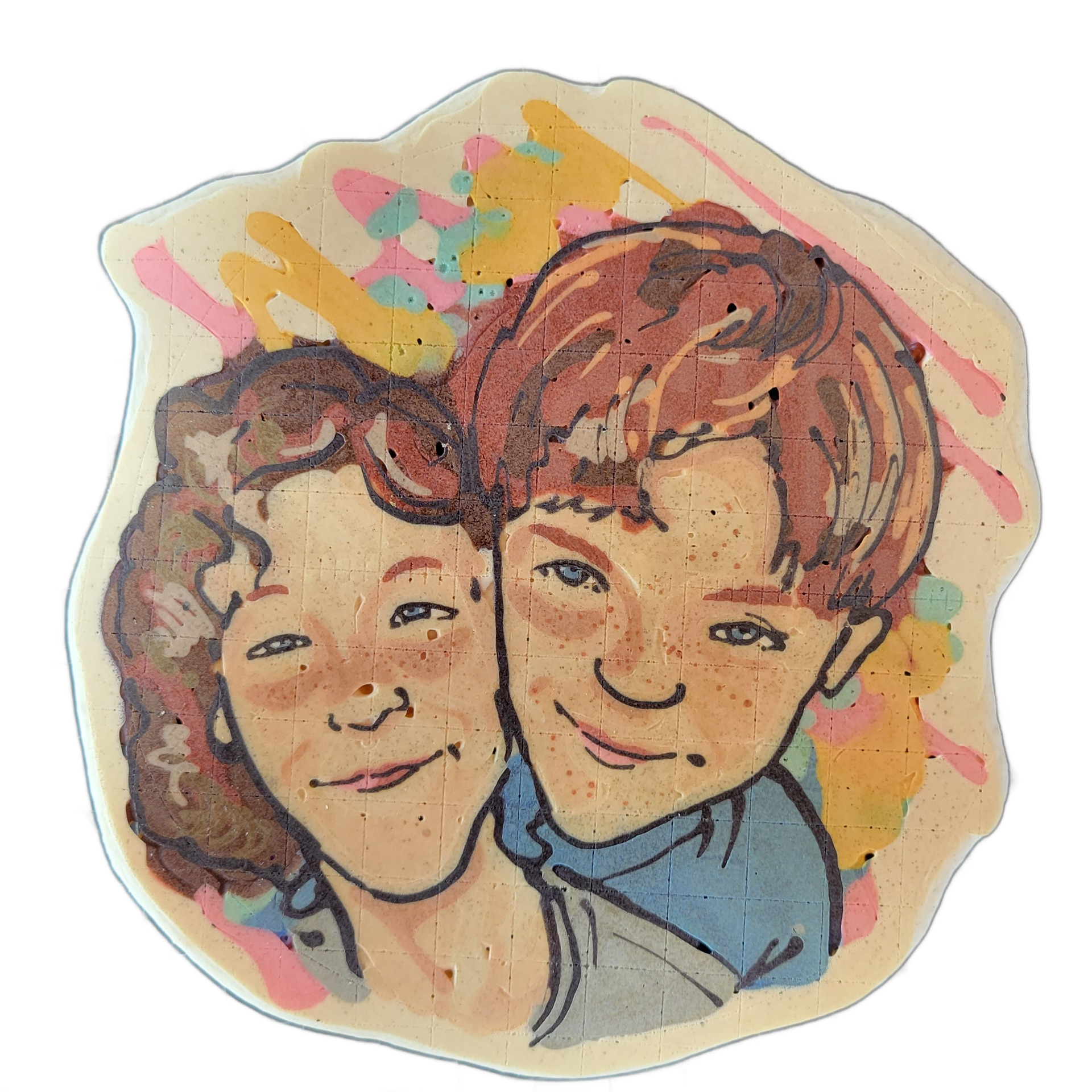 Pancake art depicting two children with reddish-brown hair posed close together, both facing forward with slight smiles; the child on the left has curly hair and the child on the right has straight hair, and both have freckles and light-colored eyes. The portrait uses bold dark outlines with warm s…