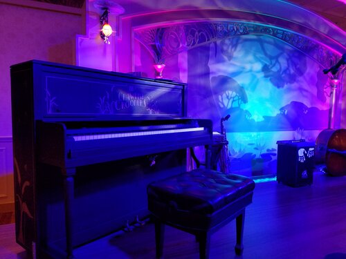 A custom upright piano shell prepared Disney Cruise Lines on stage setup with a keyboard
