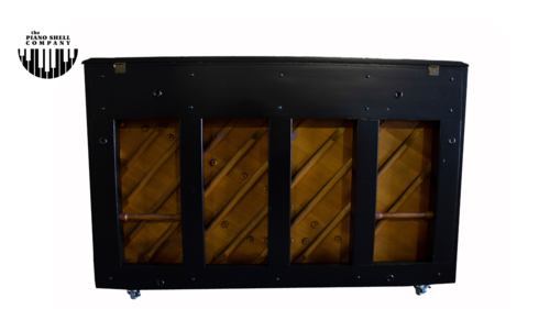 An upright piano shell prepared for the stage, studio or home