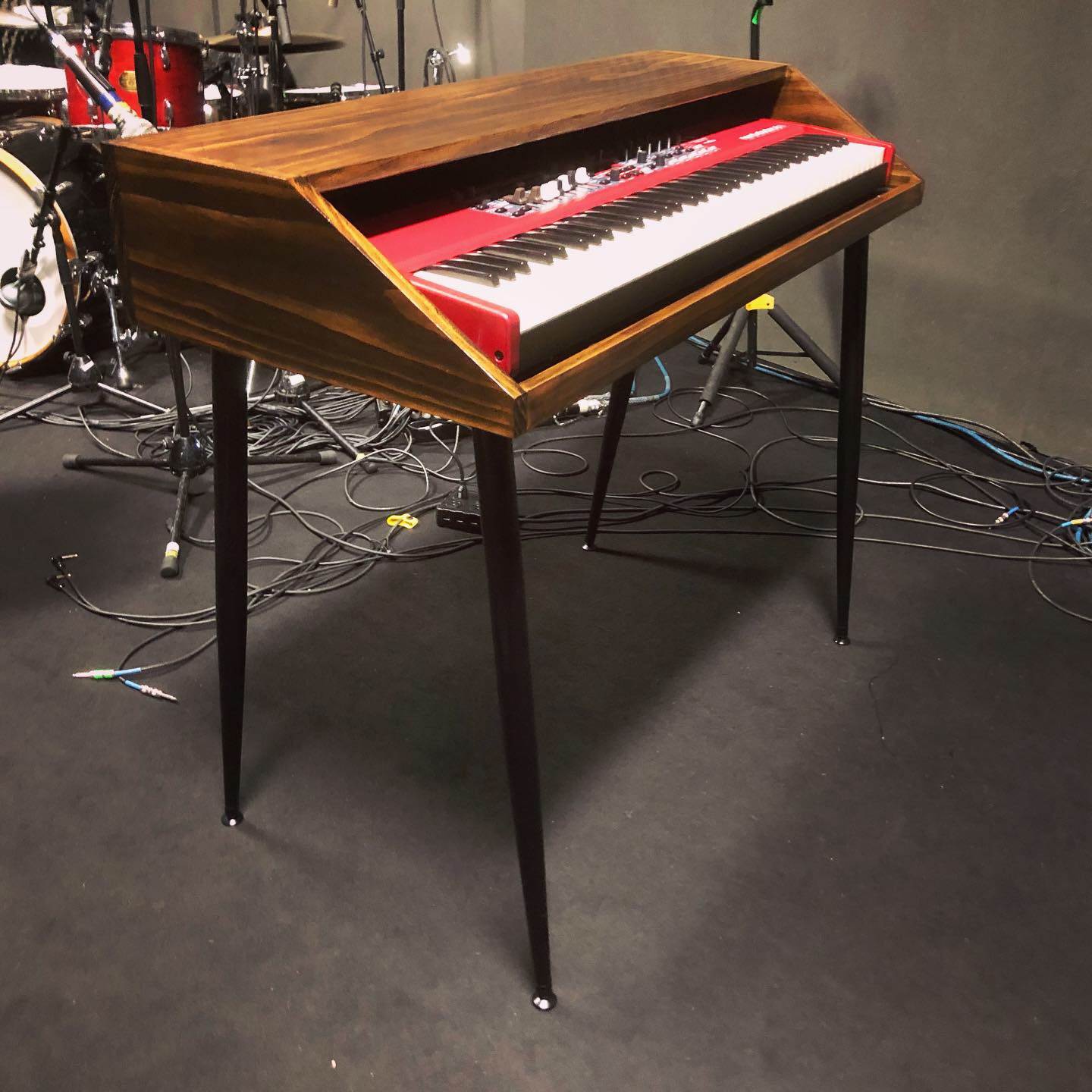 A MINI Shell stained dark walnut brown Tenth Avenue North on the stage