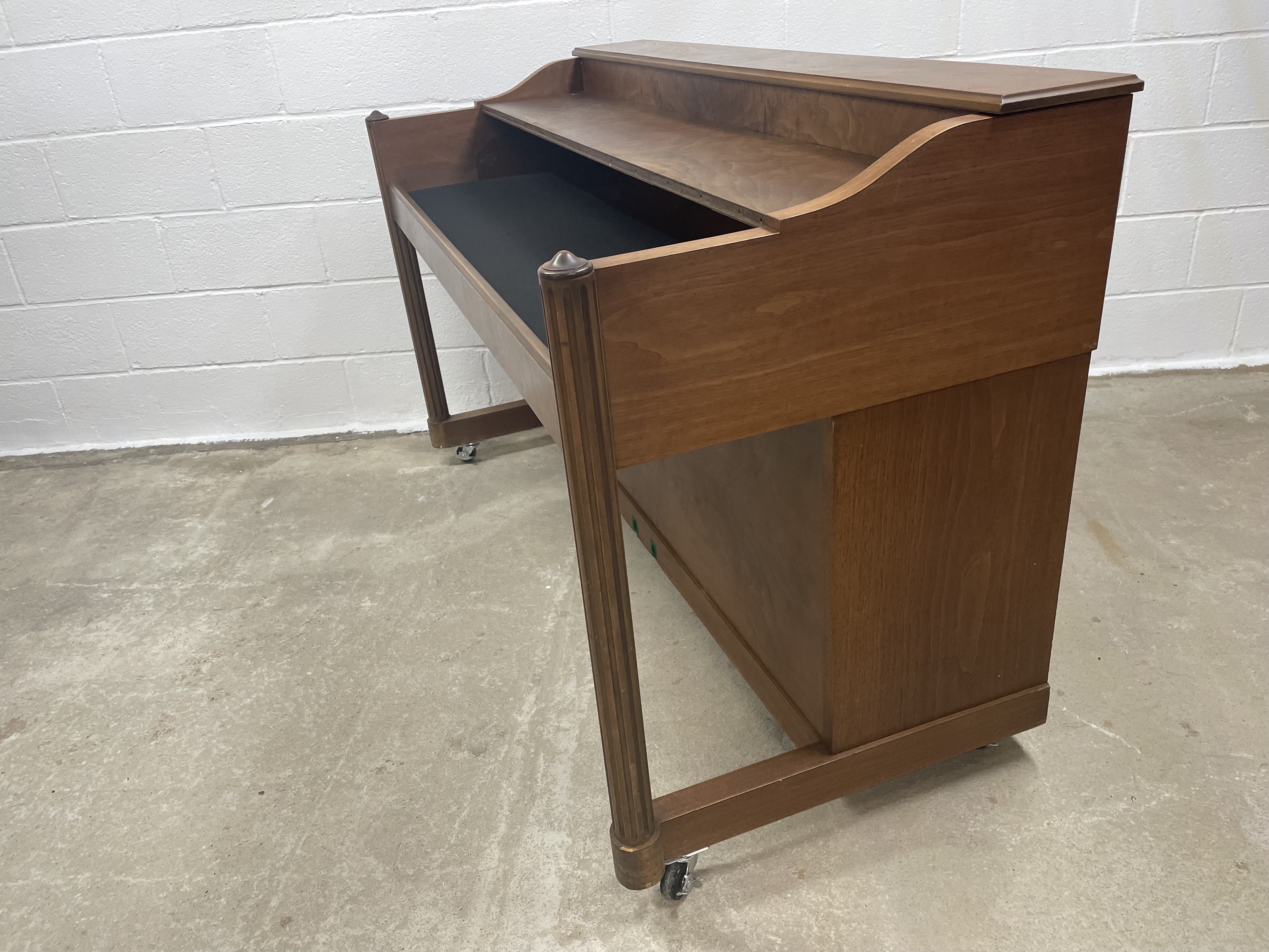 An upright piano shell prepared for the stage, studio or home