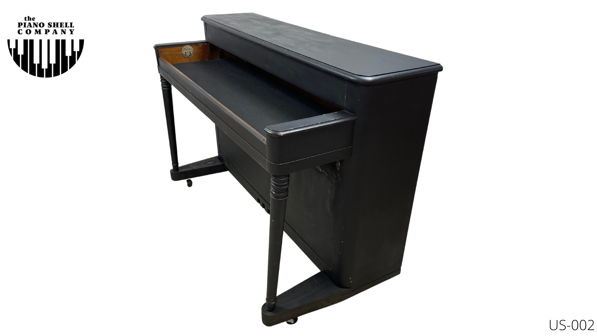 An upright piano shell prepared for the stage, studio or home