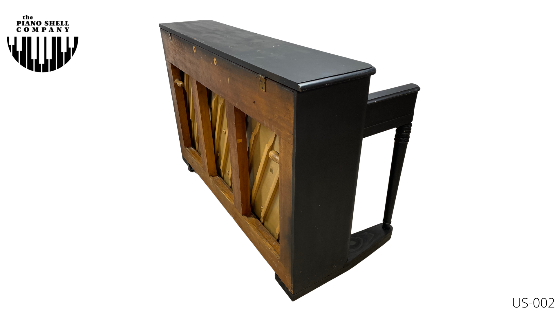 An upright piano shell prepared for the stage, studio or home
