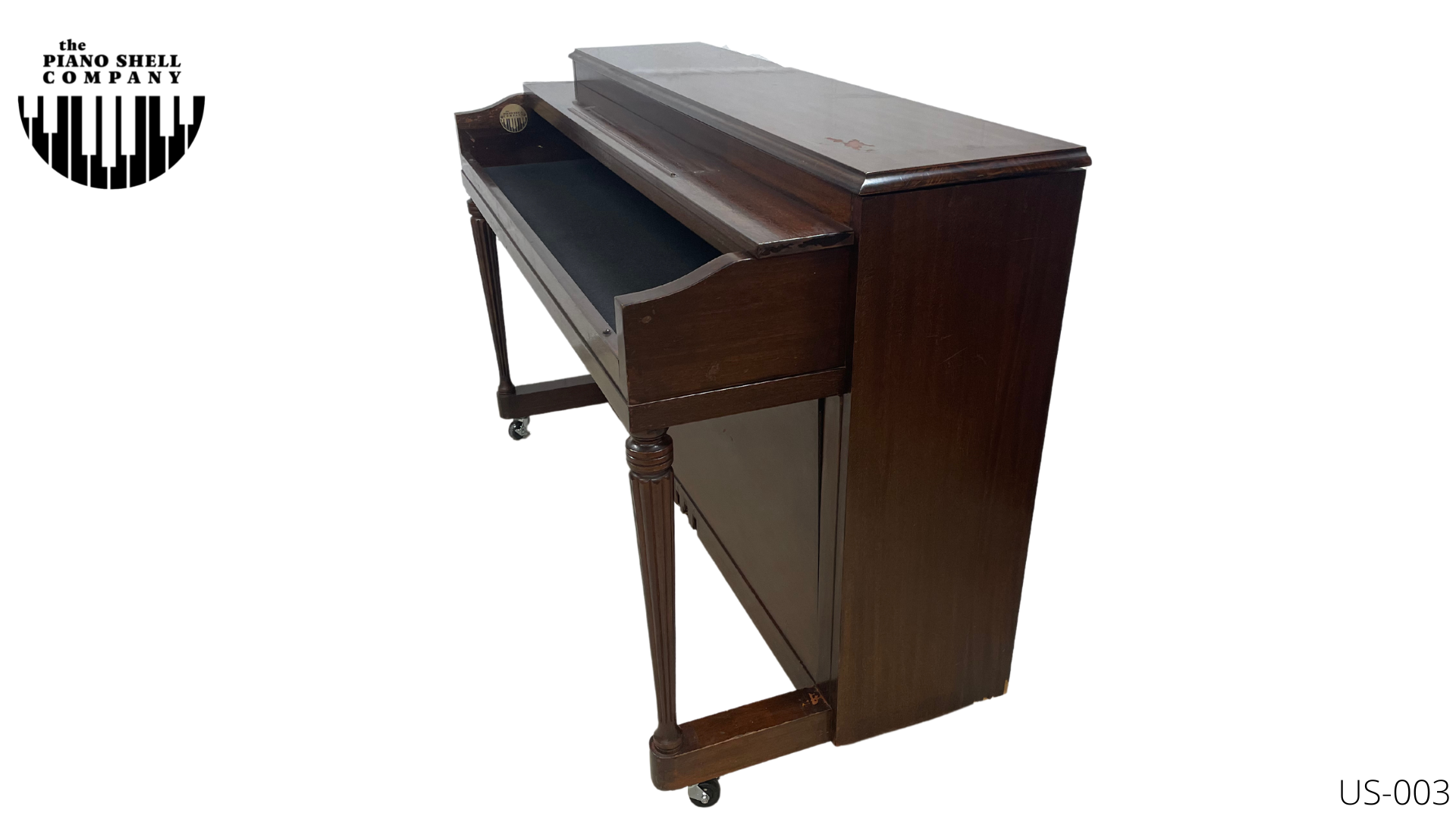 An upright piano shell prepared for the stage, studio or home