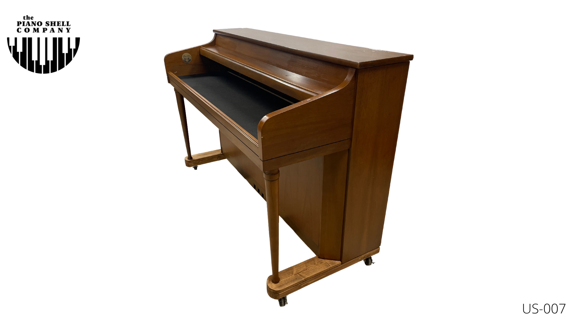 An upright piano shell prepared for the stage, studio or home