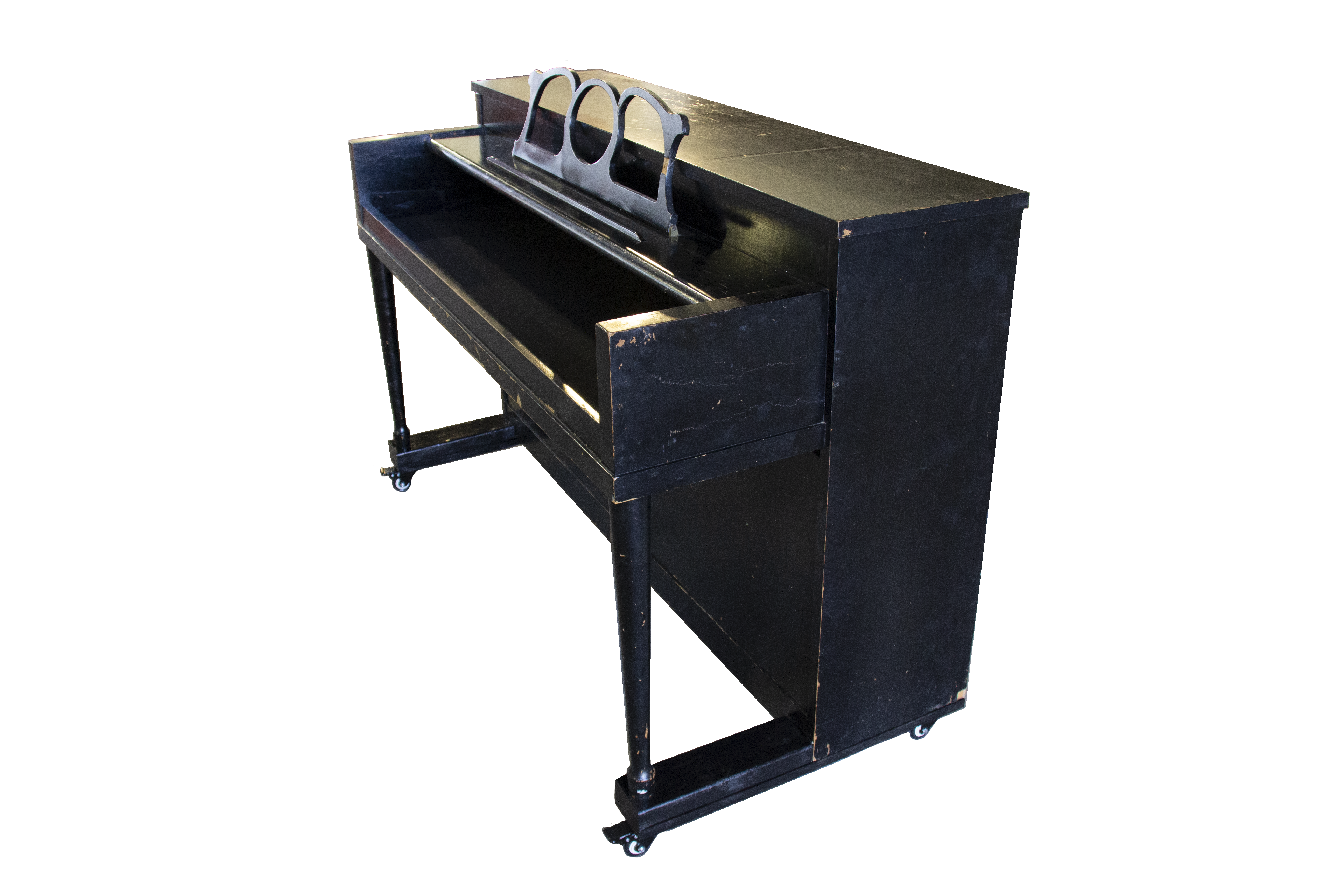 An upright piano shell prepared for the stage, studio or home