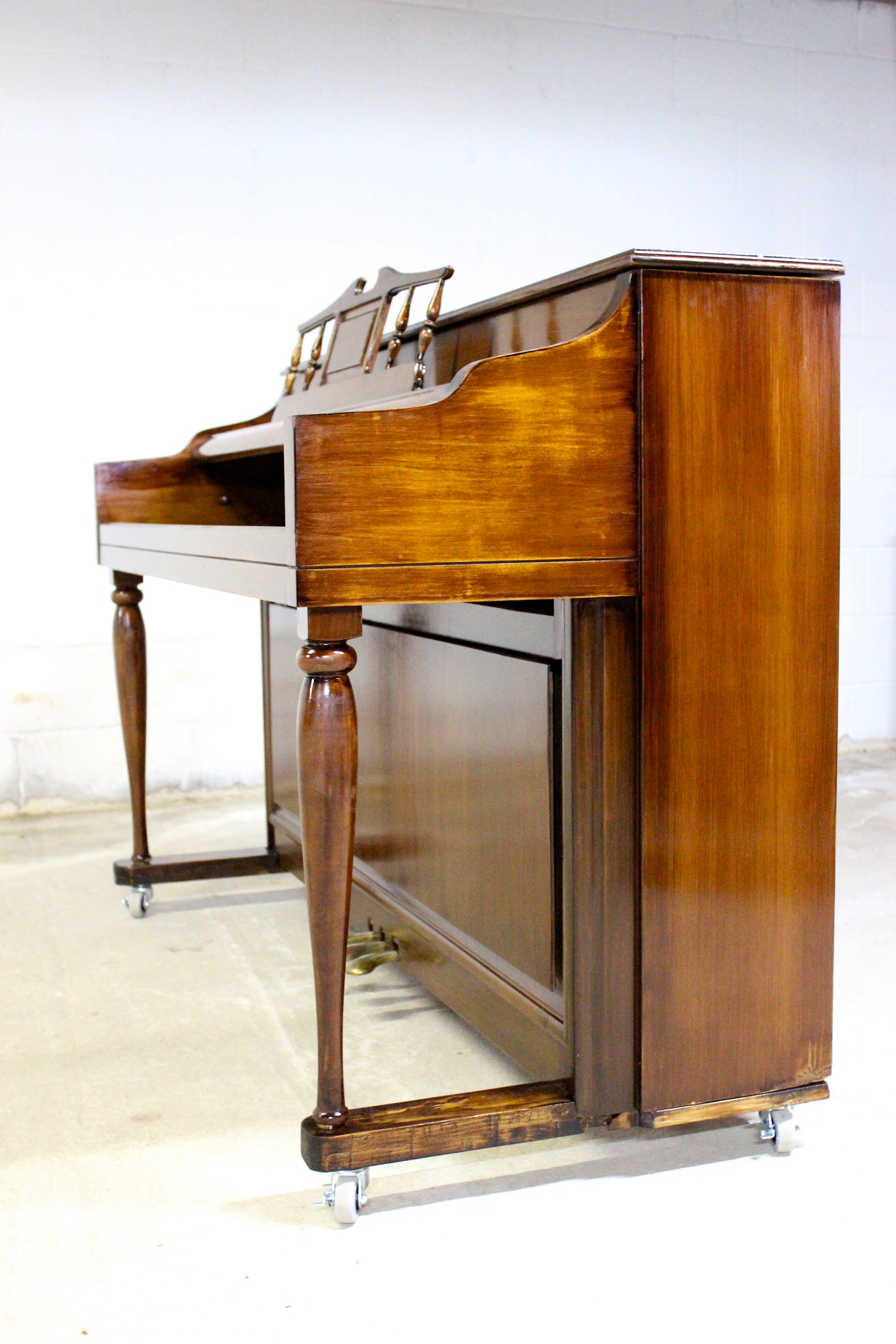 An upright piano shell prepared for the stage, studio or home