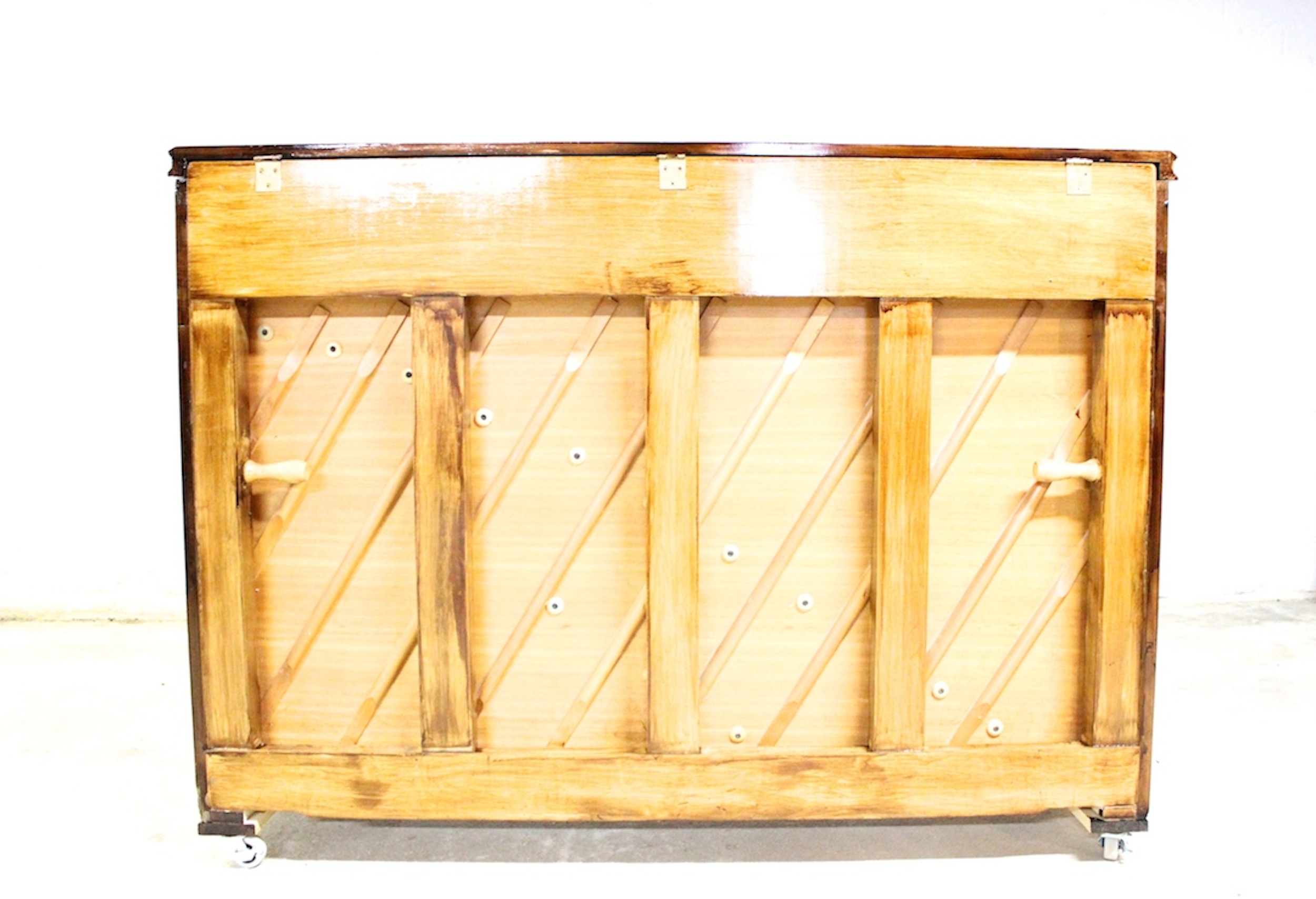 An upright piano shell prepared for the stage, studio or home
