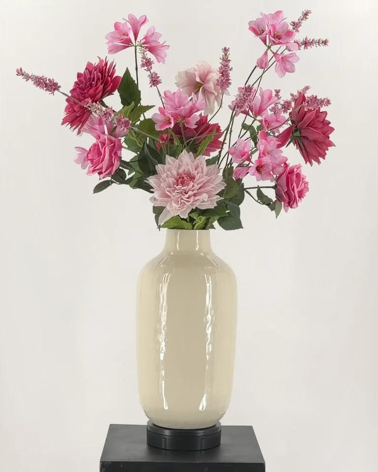 Een romantisch boeket in roze en krachtig fuchsia.