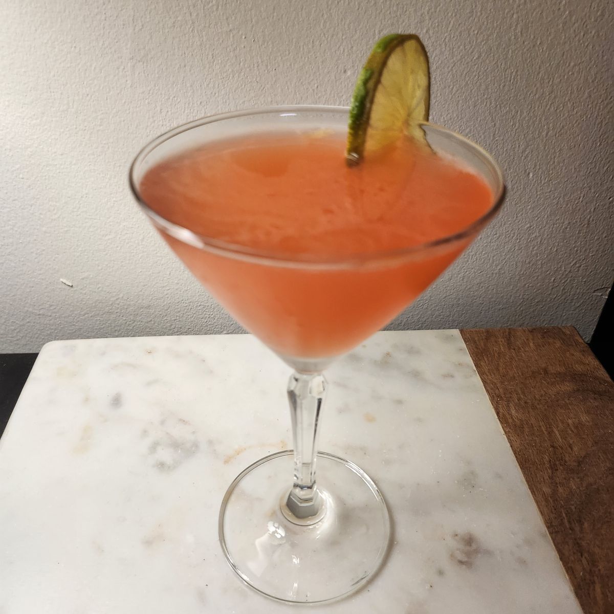 Mezcal, with a split citrus component of lime and grapefruit juice, balanced with Campari and simple syrup 