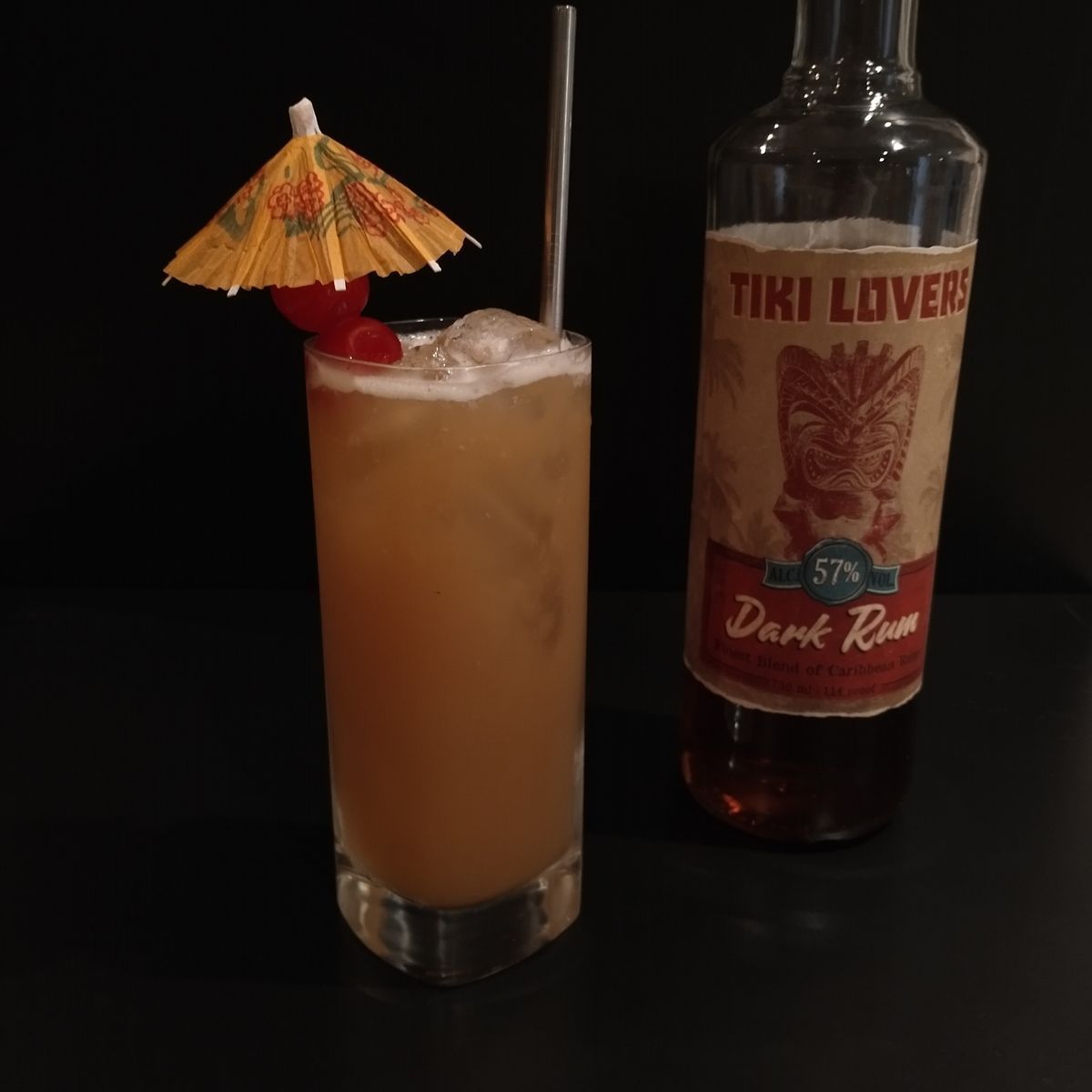 I'm excited for this first drink made with the dark rum from Tiki Lovers. This cocktail was inspired by a friend who said it's a common order at the bar where she works. Thanks, Ash.