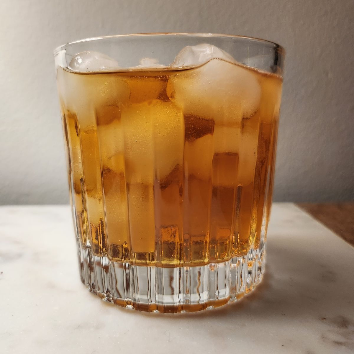 A cognac and chestnut liqueur highball named for The French Connection, a 1971 film starring Gene Hackman. The recipe originally called for amaretto, but I killed my amaretto with last week's Italian Sunset so I substituted the chestnut liqueur instead. It turned out delicious! Cheers!