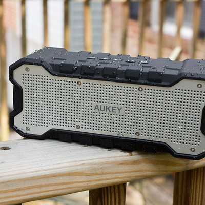 Wirelessly stream your music to this rugged Aukey Bluetooth Speaker on sale for $21