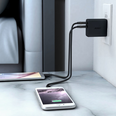 Charge two things with one outlet thanks to this $8 Aukey Wall Charger