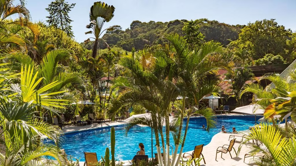 Main pool at Villas Río Mar in Dominical, Costa Rica, surrounded by tropical gardens